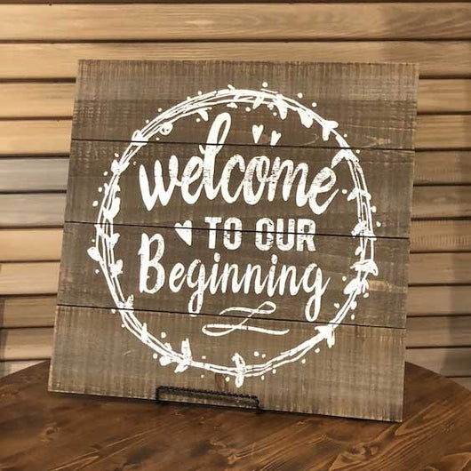 “Welcome to our beginning” Sign