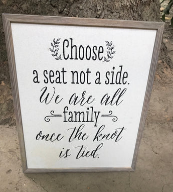 Rustic “Chose a seat not a side” sign