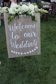 “Welcome to our wedding” wood sign
